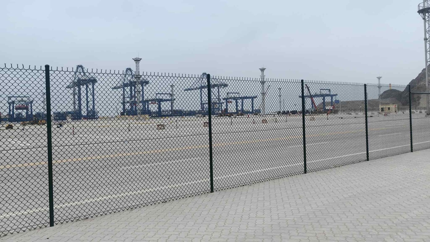 Chain link fence around the port perimeter
