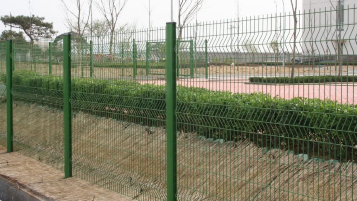 3D V-bend welded mesh fence in landscaped industrial area