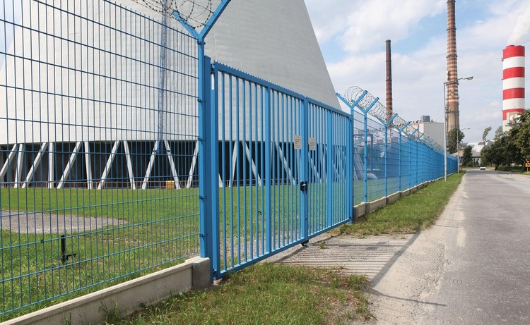 Roadside security fence at an energy facility