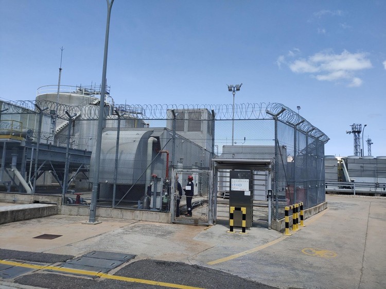 Security fence separating a critical equipment area