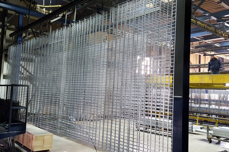 Large welded fence panels suspended during production