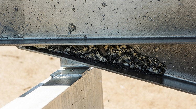 Localized roughness and zinc buildup on a galvanized steel surface